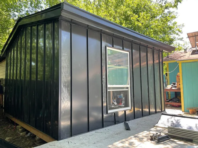 Black standing seam metal wall panels for Metal Roof Installation in Carlinville