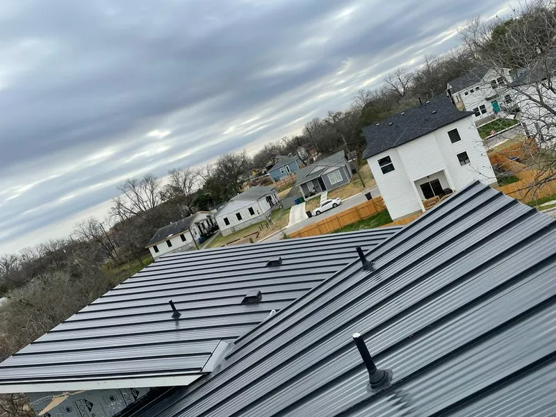 Standing seam metal roof panels with vents for Skylight Repair in Carlinville